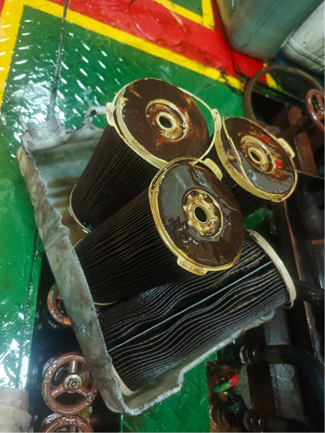 Fuel filters with heavy sludge after 6 days before additive use
